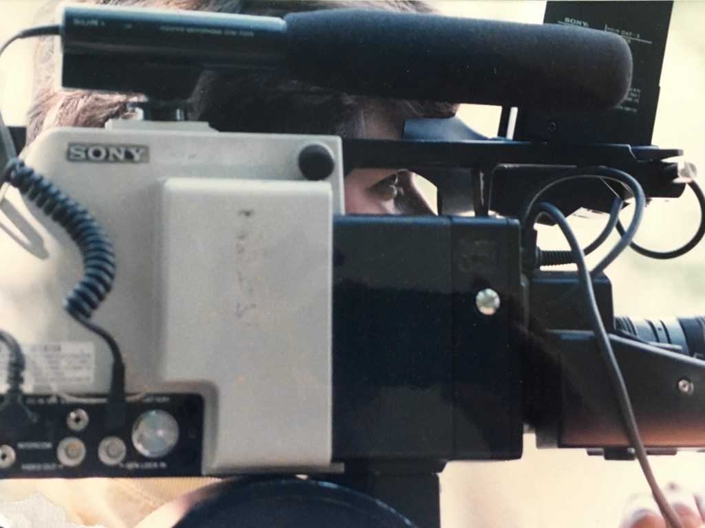 Sony video camera from the side with the shooter's eye visible