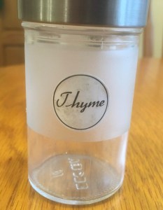 Empty spice bottle with Thyme label